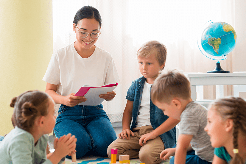 kindergarten-teacher-holding-notebook